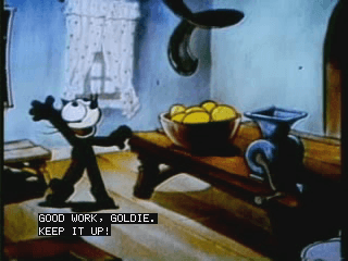 Frame aus einem alten Cartoon mit Untertiteln "Good work, Goldie. Keep it up!"