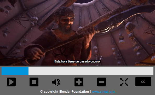 Videoplayer mit Standardsteuerungen wie Abspielen, Stoppen, Lautstärke und Untertiteln An und Aus. Das laufende Video zeigt eine Szene eines Mannes mit einem speerähnlichen Waffen, und ein Untertitel lautet "Esta hoja tiene pasado oscuro."